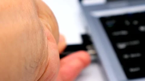 A person inserting a USB memory stick into a computer. Stock Footage 335274369