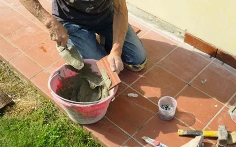 Person intent on fixing and instiling and repairing craftsman at work Stock Photos