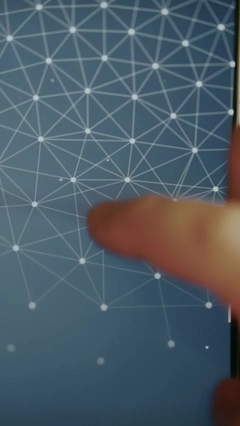 Person interacting with a digital network mesh formed by connected lines and Stock Footage 333840969