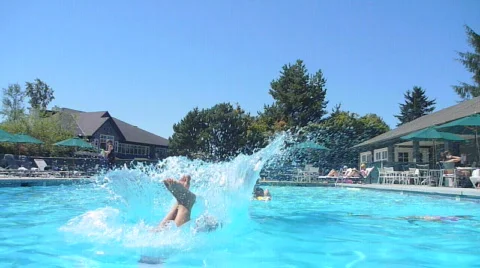 Person Jumps Into Pool And Does A Cannonball Stock Footage 829445