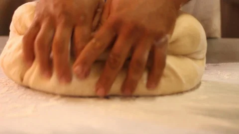 Person kneading dough to make bread 스톡 동영상 130086520