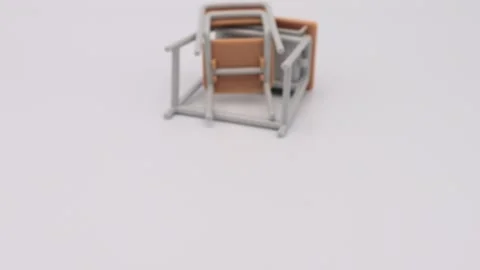 A person knocks over a desk and chair. Stock-Footage 336658023