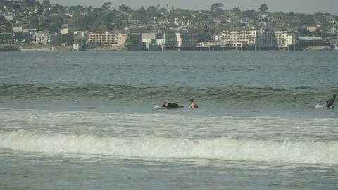 A person learning to surf wipes out in ocean waves Video stock 342151424