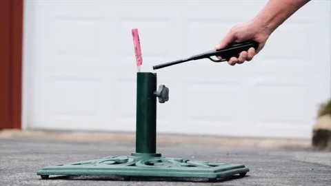 Person lighting bottle rocket. Static. Blurry. Slow motion Stock Footage 112147046