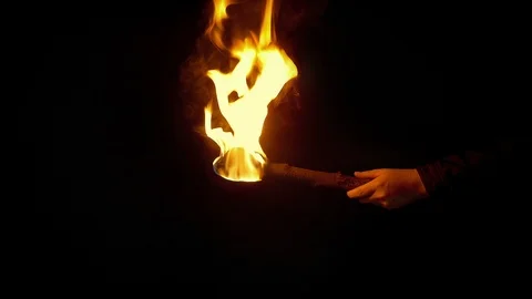 Person Lights Wood Torch In The Dark Stock Footage