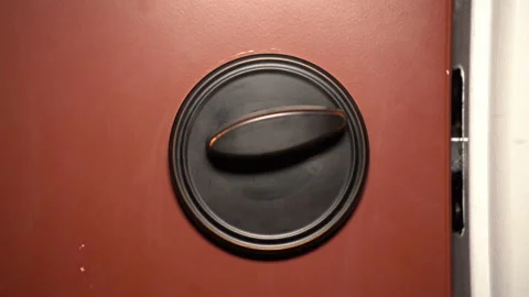 Person lock door, Deadbolt locks, Red Door, Inside the house Video stock 166811031