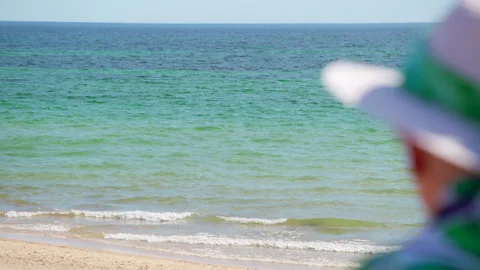 Person looking out to ocean Stock Footage 282629140