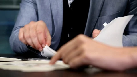 Person Looking Through Documents 스톡 동영상 99198912