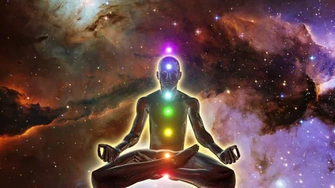 Person in lotus yoga pose achieving enlightenment Seven Chakras Space Version Stock Footage