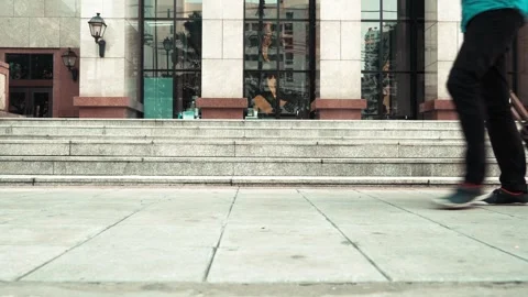Person with Luggage Walking Down Steps Stock Footage 314665558