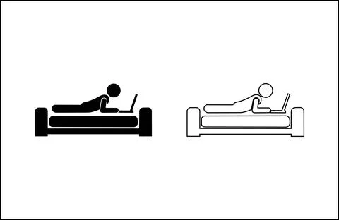 Person lying on bed using laptop イラスト素材