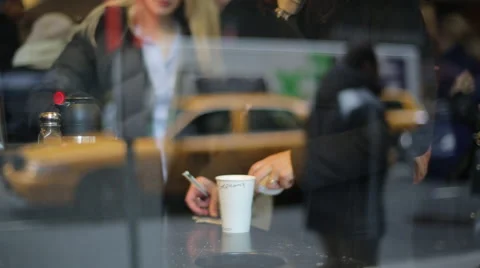 Person Makes coffee in reflection of city Stock Footage 48613855