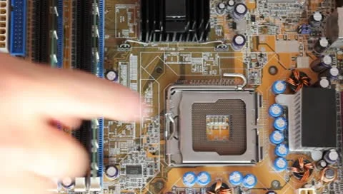 A person makes a computer processor on the motherboard. HD H.264 Stock Footage 10573284