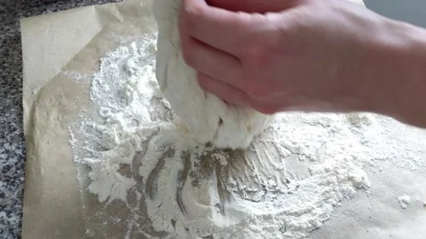 Person making bread dough ball, hands close up Stock Footage 236777067