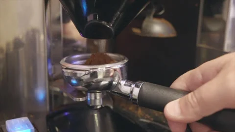 A person is making coffee with a coffee grinder Stock Footage 301620894