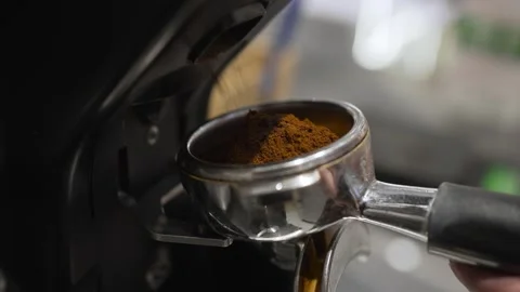 A person is making coffee with a coffee grinder Stock Footage 308219661