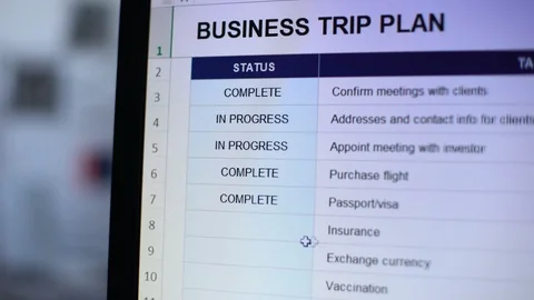 Person making complete status to one task of business trip plan, readiness Stock Footage 104041755