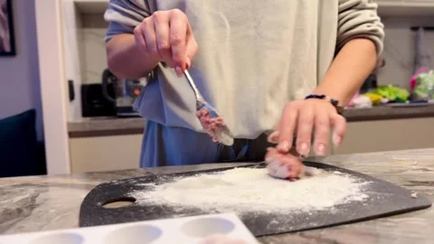 A person is making a dessert in a kitchen Stock Footage 270364930
