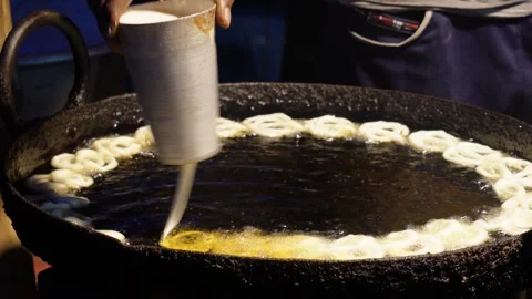 A person making jalebi Stock-Footage 326324261
