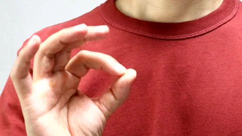 A person making an OK sign Stock Footage 335599753