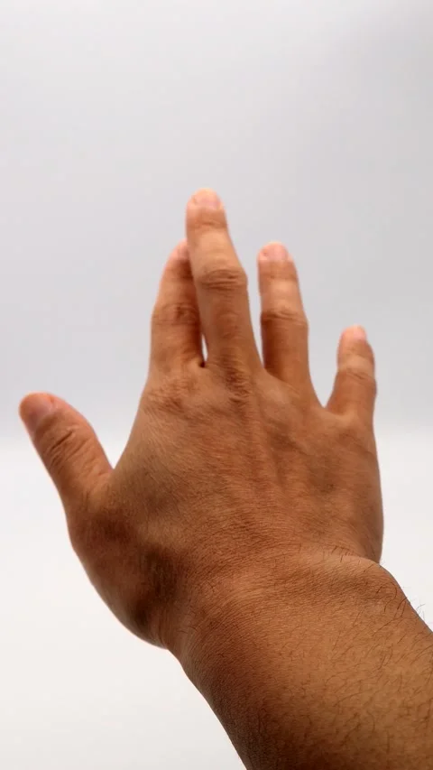 A person making a pose with their fingers Stock Footage 335550217