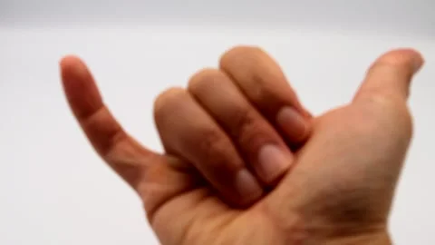 A person making a pose with their fingers Stock Footage 335557442