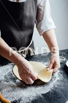 Person making shortcrust pastry Stock Photos