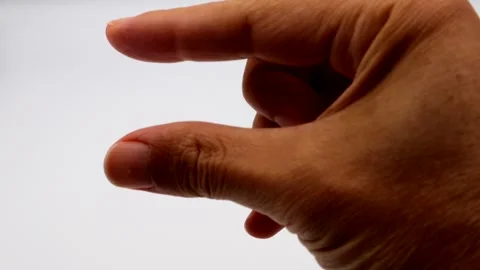 A person making a slight gesture with their fingers. Stock-Footage 335584091