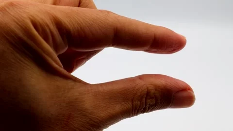 A person making a slight gesture with their fingers. Stock Footage 335584875