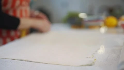 A person is making something on a countertop Stock Footage 295370059