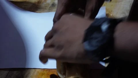 Person making a vegetable or eggs roll Stock Footage 326332668