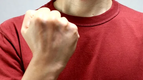 A person making a victory pose 動画素材 335600703
