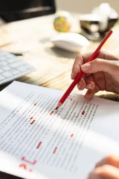 Person Marking Error With Red Marker Stock Photos