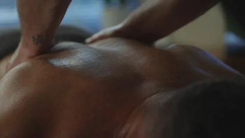 A person is massaging another person's back Stock Footage 302481214