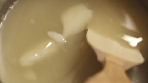Person mixes the soap mass in the process of making soap Stock Footage 278209198