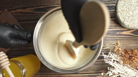 Person mixes the soap mass in the process of making soap Stock Footage 278209245