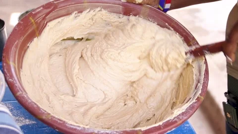Person mixing bread flour for baking. Stock Footage 229377247