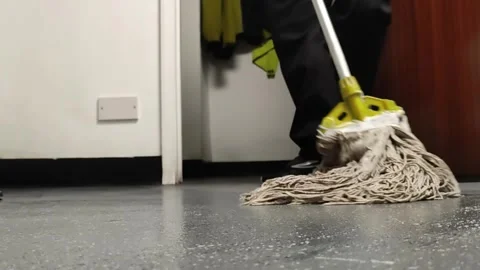 Person Mopping Floor with Mop in Indoor Room Stock Footage 346818070