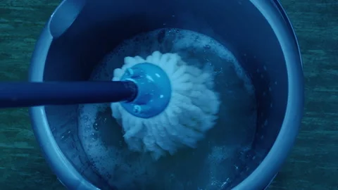 Person Mops The Floor With Soapy Water Stock Footage 161973233