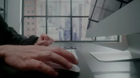 Person moves mouse types on keyboard touches phone screen Stock Footage 162545600