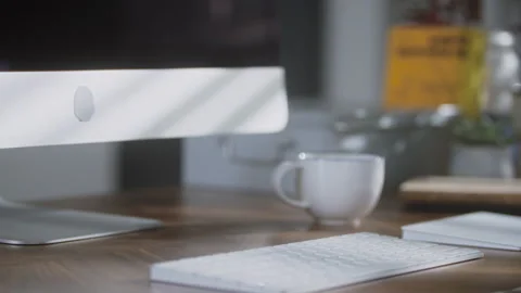 Person moving near a computer screen in a room timelapse Stock Footage 274579162