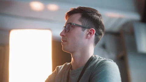 Person Observing Equipment in TV Studio with Reflection in Glasses Stock Footage 317547041