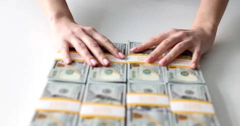 Person offers or refuses stacks of dollar bribes Video stock 234596641