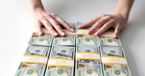 Person offers or refuses stacks of dollar bribes Stock Footage 256292472