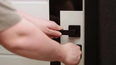 Person Opening Door with Black Handle Stock Footage 339070825