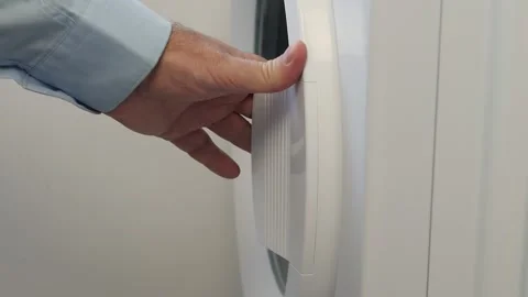 Person Opening the Washing Machine Front Door and Checking the Load. Stock Footage 249209086