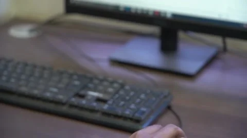 Person operating computer with mouse and keyboard for 3d applications and Stock Footage 201275365