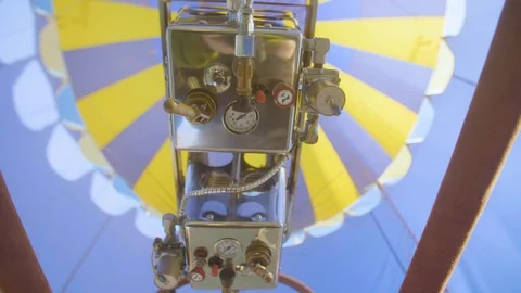 Person operating machine of hot air balloon Stock Footage 87837975