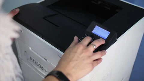 Person operating a office printer control panel Stock Footage 301409306