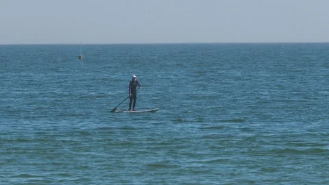 Person on Paddle Board Stock Footage 111282416
